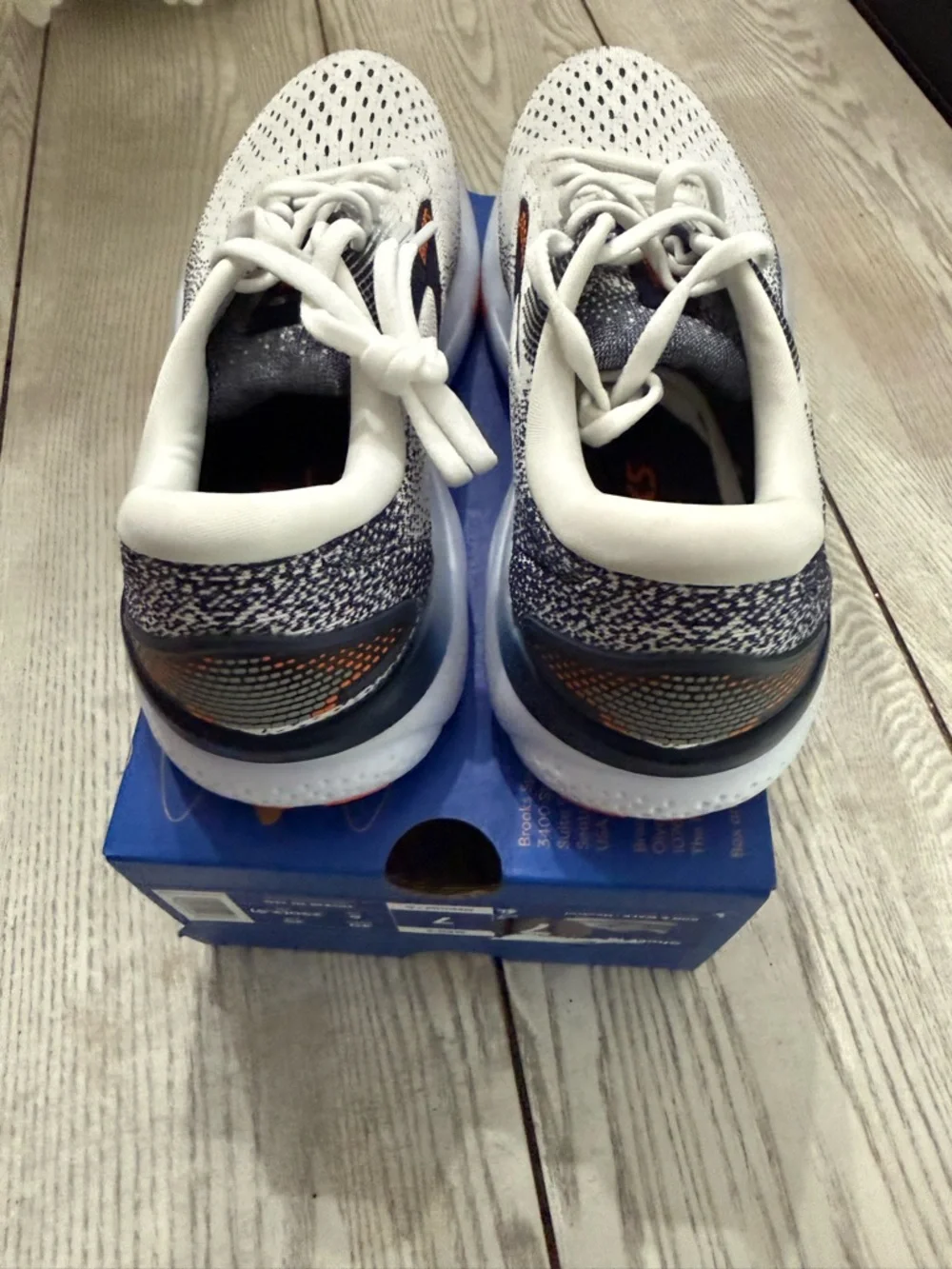 Brooks White and Navy Running Shoes with Orange Logo Accents
